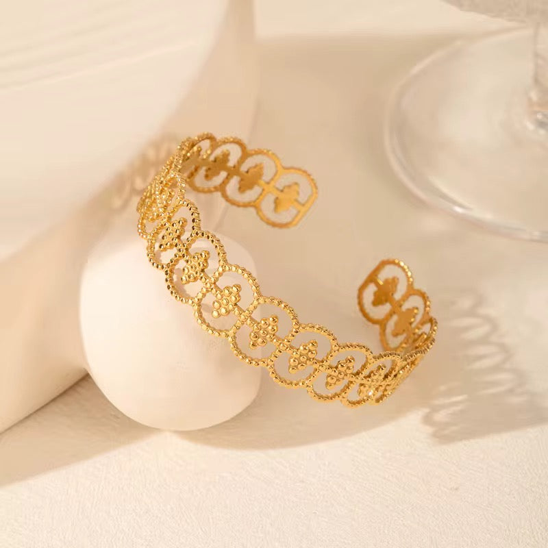 Gold open bangle