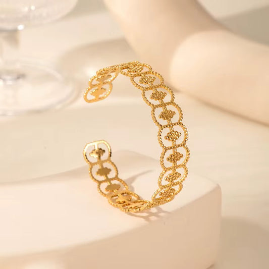 Gold open bangle